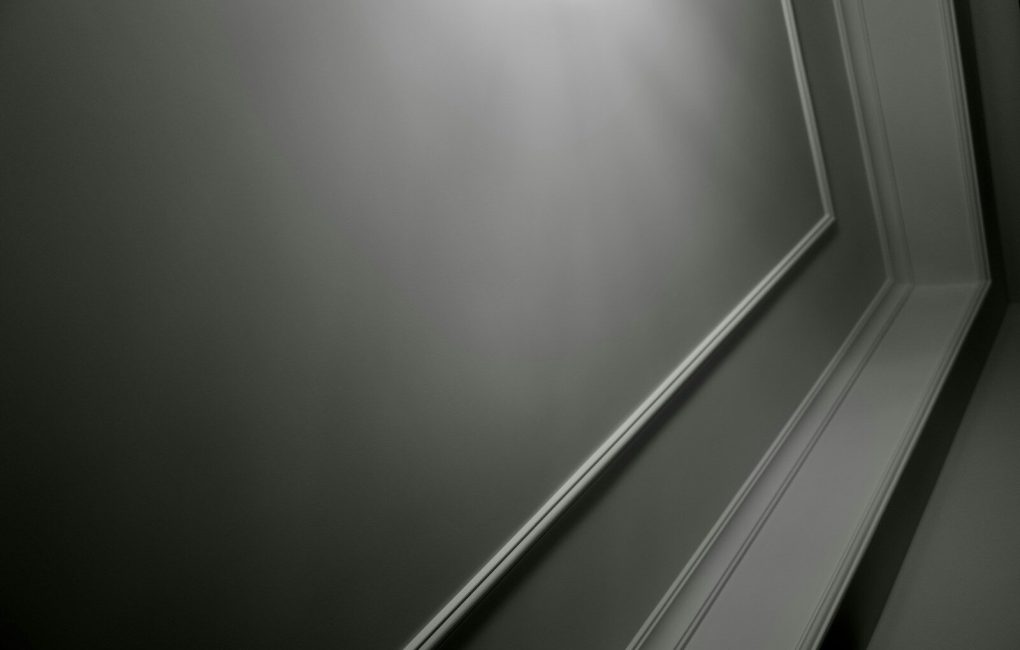 A black and white photo of a hallway